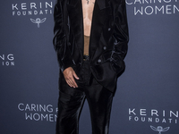 Evan Ross attends Kering's 3rd Annual Caring for Women Dinner at The Pool in New York, USA, on September 9, 2024. (