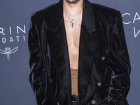 Evan Ross attends Kering's 3rd Annual Caring for Women Dinner at The Pool in New York, USA, on September 9, 2024. (