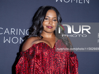 Adrienne Warren attends Kering's 3rd Annual Caring for Women Dinner at The Pool in New York, USA, on September 9, 2024. (