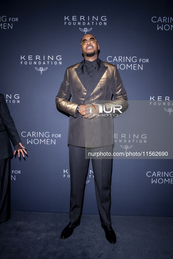 Carmelo Anthony attends Kering's 3rd Annual Caring for Women Dinner at The Pool in New York, New York, USA, on September 9, 2024. 