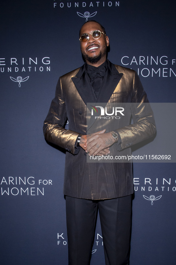 Carmelo Anthony attends Kering's 3rd Annual Caring for Women Dinner at The Pool in New York, New York, USA, on September 9, 2024. 