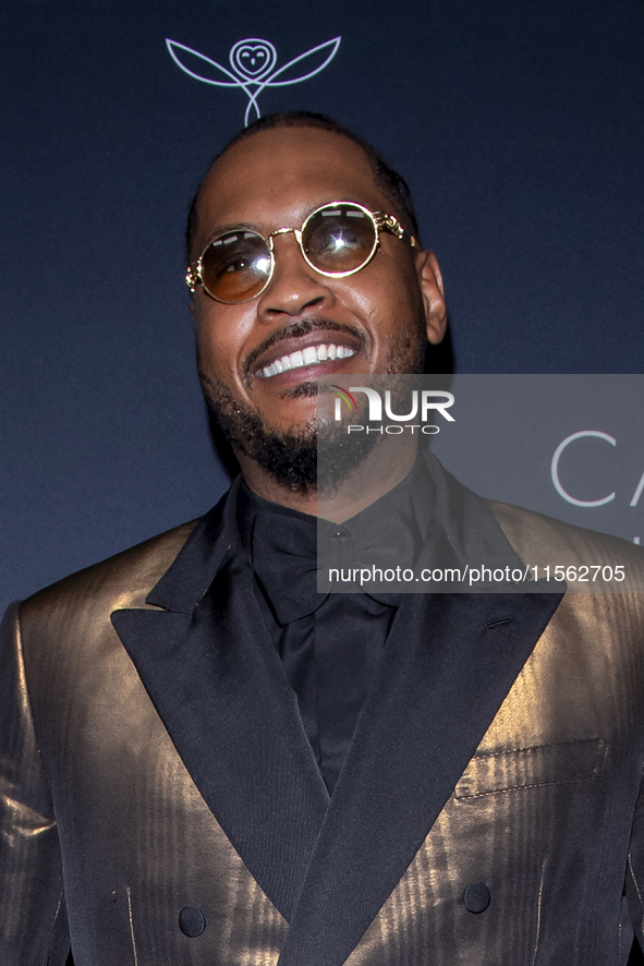 Carmelo Anthony attends Kering's 3rd Annual Caring for Women Dinner at The Pool in New York, New York, USA, on September 9, 2024. 