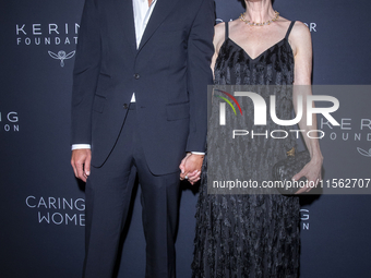 Bart Freundlich and Julianne Moore attend Kering's 3rd Annual Caring for Women Dinner at The Pool in New York, USA, on September 9, 2024. (