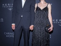 Bart Freundlich and Julianne Moore attend Kering's 3rd Annual Caring for Women Dinner at The Pool in New York, USA, on September 9, 2024. (