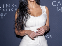 Kim Kardashian attends Kering's 3rd Annual Caring for Women Dinner at The Pool in New York, New York, USA, on September 09, 2024. (