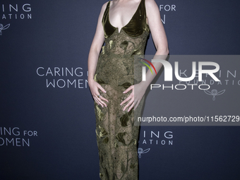 Julia Garner attends Kering's 3rd Annual Caring for Women Dinner at The Pool in New York, New York, USA, on September 9, 2024. (