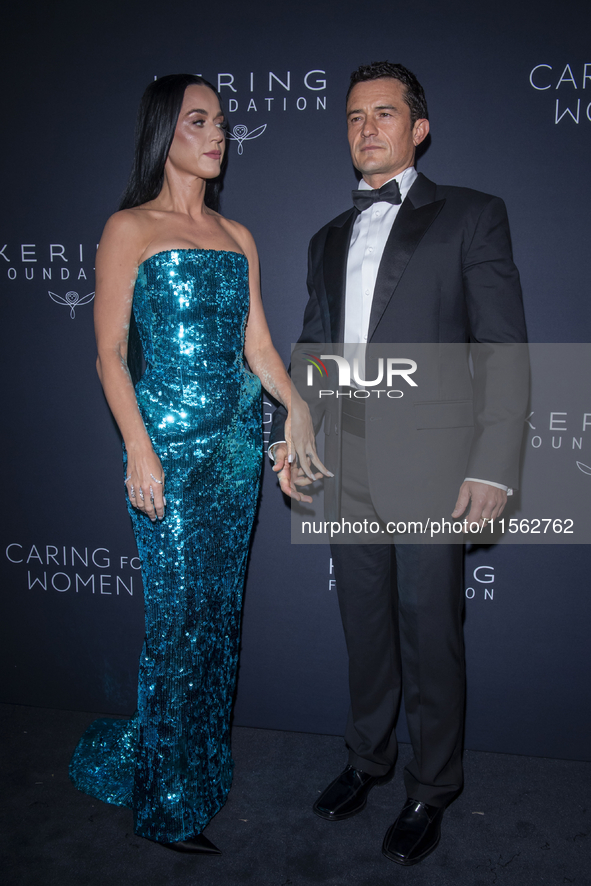 Katy Perry and Orlando Bloom attend Kering's 3rd Annual Caring for Women Dinner at The Pool in New York, New York, USA, on September 9, 2024...