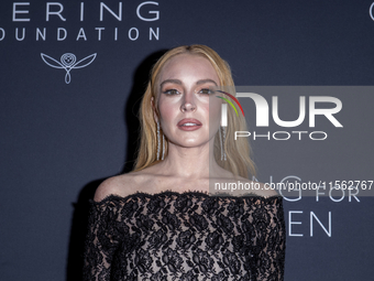 Lindsay Lohan attends Kering's 3rd Annual Caring for Women Dinner at The Pool in New York, USA, on September 9, 2024. (