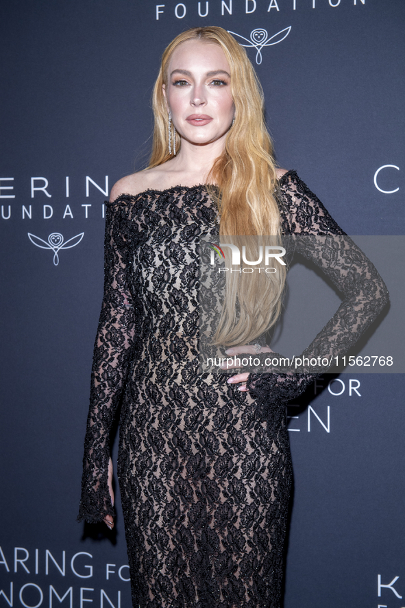 Lindsay Lohan attends Kering's 3rd Annual Caring for Women Dinner at The Pool in New York, USA, on September 9, 2024. 