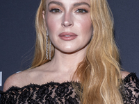 Lindsay Lohan attends Kering's 3rd Annual Caring for Women Dinner at The Pool in New York, USA, on September 9, 2024. (