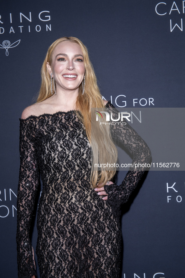 Lindsay Lohan attends Kering's 3rd Annual Caring for Women Dinner at The Pool in New York, USA, on September 9, 2024. 