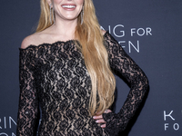 Lindsay Lohan attends Kering's 3rd Annual Caring for Women Dinner at The Pool in New York, USA, on September 9, 2024. (