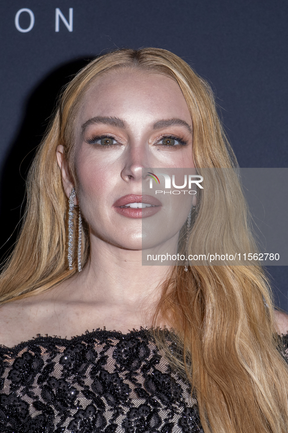 Lindsay Lohan attends Kering's 3rd Annual Caring for Women Dinner at The Pool in New York, USA, on September 9, 2024. 