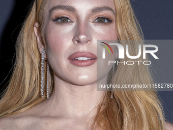 Lindsay Lohan attends Kering's 3rd Annual Caring for Women Dinner at The Pool in New York, USA, on September 9, 2024. (