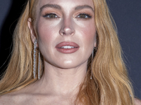 Lindsay Lohan attends Kering's 3rd Annual Caring for Women Dinner at The Pool in New York, USA, on September 9, 2024. (