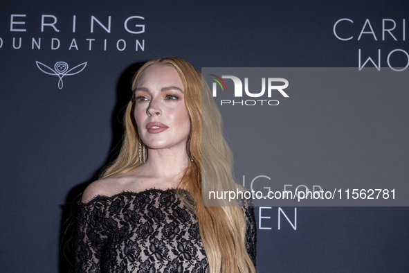 Lindsay Lohan attends Kering's 3rd Annual Caring for Women Dinner at The Pool in New York, USA, on September 9, 2024. 