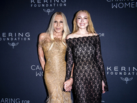 Donatella Versace and Lindsay Lohan attend Kering's 3rd Annual Caring for Women Dinner at The Pool in New York, USA, on September 9, 2024. (