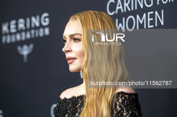 Lindsay Lohan attends Kering's 3rd Annual Caring for Women Dinner at The Pool in New York, USA, on September 9, 2024. 