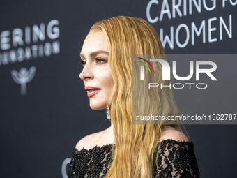 Lindsay Lohan attends Kering's 3rd Annual Caring for Women Dinner at The Pool in New York, USA, on September 9, 2024. (