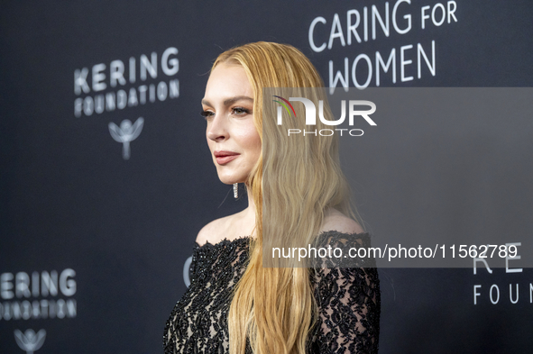 Lindsay Lohan attends Kering's 3rd Annual Caring for Women Dinner at The Pool in New York, USA, on September 9, 2024. 