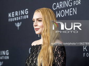 Lindsay Lohan attends Kering's 3rd Annual Caring for Women Dinner at The Pool in New York, USA, on September 9, 2024. (