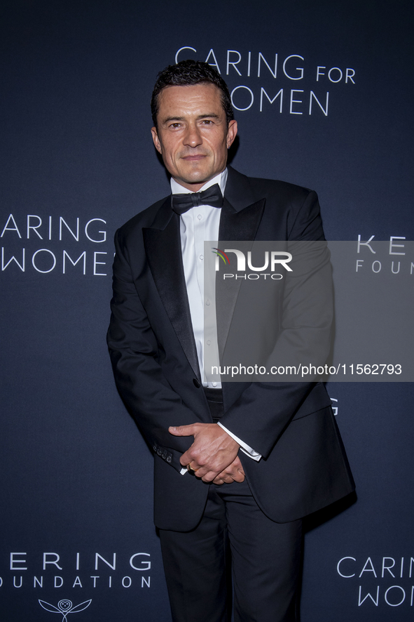 Orlando Bloom attends Kering's 3rd Annual Caring for Women Dinner at The Pool in New York, USA, on September 9, 2024. 