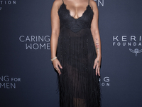 Raye attends Kering's 3rd Annual Caring for Women Dinner at The Pool in New York, New York, USA, on September 09, 2024. (