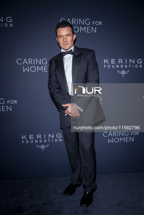 Orlando Bloom attends Kering's 3rd Annual Caring for Women Dinner at The Pool in New York, USA, on September 9, 2024. 