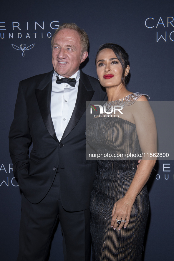 Francois-Henri Pinault and Salma Hayek attend Kering's 3rd Annual Caring for Women Dinner at The Pool in New York, New York, USA, on Septemb...