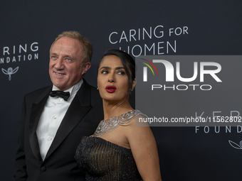 Francois-Henri Pinault and Salma Hayek attend Kering's 3rd Annual Caring for Women Dinner at The Pool in New York, New York, USA, on Septemb...