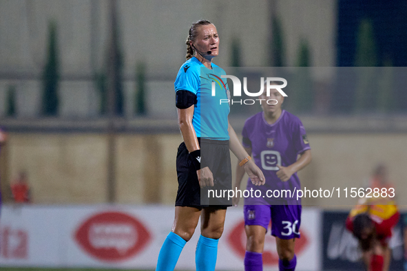 Tatyana Sorokopudova, a UEFA-appointed match referee, gestures during the UEFA Women's Champions League First qualifying round, Semi-finals...