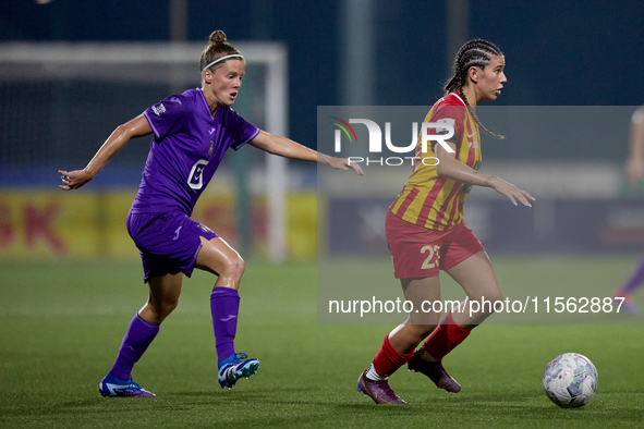 Mariah Cardona (R) of Birkirkara is closely followed by Laura Deloose (L) of Anderlecht during the UEFA Women's Champions League First quali...