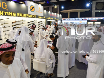 Qatari visitors attend the 8th edition of the Katara International Hunting and Falcons Exhibition 2024 (S'hail) at Katara Cultural Village i...