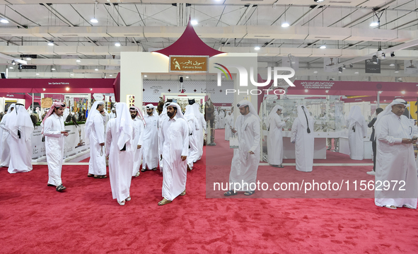 Qatari visitors attend the 8th edition of the Katara International Hunting and Falcons Exhibition 2024 (S'hail) at Katara Cultural Village i...