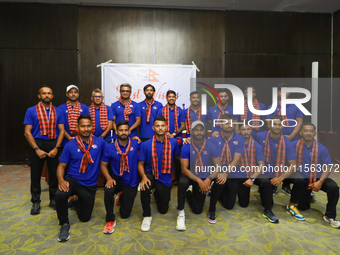 Officials and players from the Nepali national cricket team pose for a photo as they depart from Kathmandu, Nepal, on September 10, 2024. Ne...