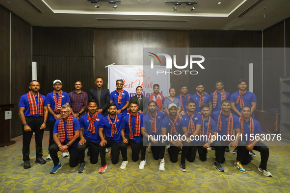 Officials and players from the Nepali national cricket team pose for a photo as they depart from Kathmandu, Nepal, on September 10, 2024. Ne...