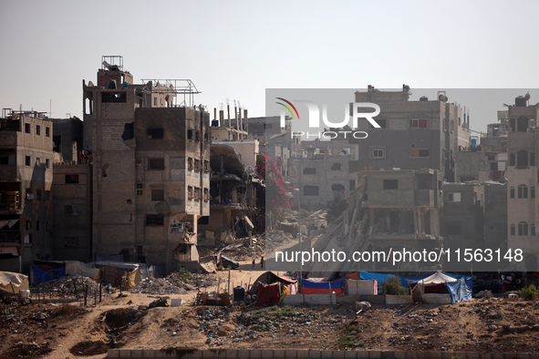 Displaced Palestinians shelter in a tent camp amid the Israel-Hamas conflict in the Al-Mawasi area in Khan Younis, in the southern Gaza Stri...