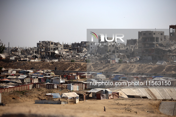 Displaced Palestinians shelter in a tent camp amid the Israel-Hamas conflict in the Al-Mawasi area in Khan Younis, in the southern Gaza Stri...