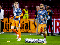 Netherlands forward Cody Gakpo and Netherlands midfielder Jerdy Schouten during the match between the Netherlands and Germany at the Johan C...