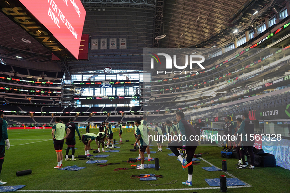 Members of the Mexican national soccer team train during media day before the match against Team Canada at the AT&T Stadium in Arlington, Te...