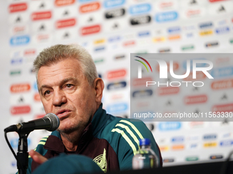 Javier Aguirre, Head Coach of the Mexican national soccer team, answers questions from the media during the media day before the match again...