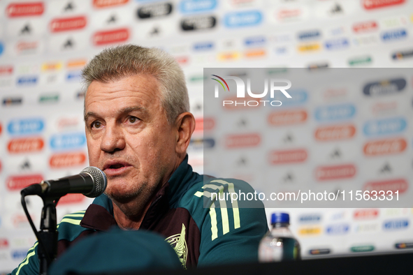 Javier Aguirre, Head Coach of the Mexican national soccer team, answers questions from the media during the media day before the match again...