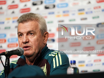 Javier Aguirre, Head Coach of the Mexican national soccer team, answers questions from the media during the media day before the match again...