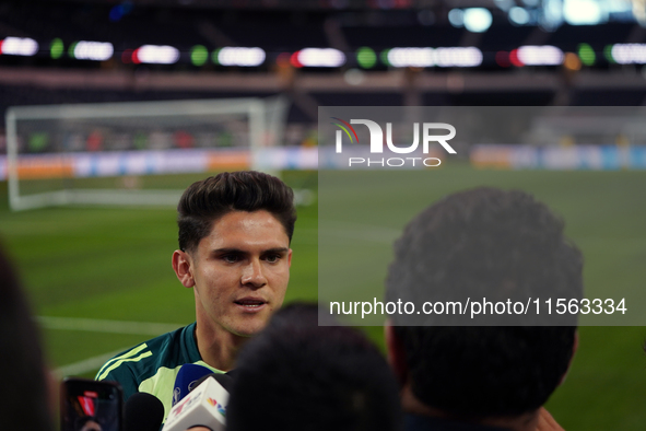 Mexican national soccer player Israel Reyes answers questions from the media during the media day before the match against Team Canada at th...