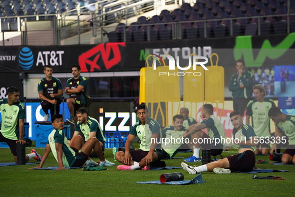 Members of the Mexican national soccer team train during media day before the match against Team Canada at the AT&T Stadium in Arlington, Te...