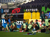 Members of the Mexican national soccer team train during media day before the match against Team Canada at the AT&T Stadium in Arlington, Te...