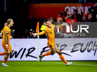 Netherlands midfielder Tijani Reijnders scores the 1-0 and celebrates the goal during the match between the Netherlands and Germany at the J...