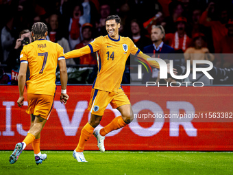 Netherlands midfielder Tijani Reijnders scores the 1-0 and celebrates the goal during the match between the Netherlands and Germany at the J...