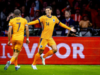 Netherlands midfielder Tijani Reijnders scores the 1-0 and celebrates the goal during the match between the Netherlands and Germany at the J...