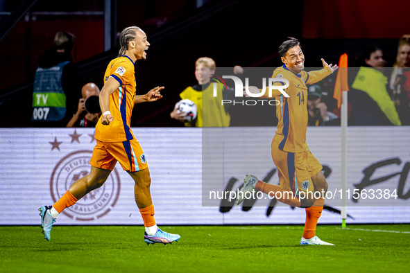 Netherlands midfielder Tijani Reijnders scores the 1-0 and celebrates the goal during the match between the Netherlands and Germany at the J...